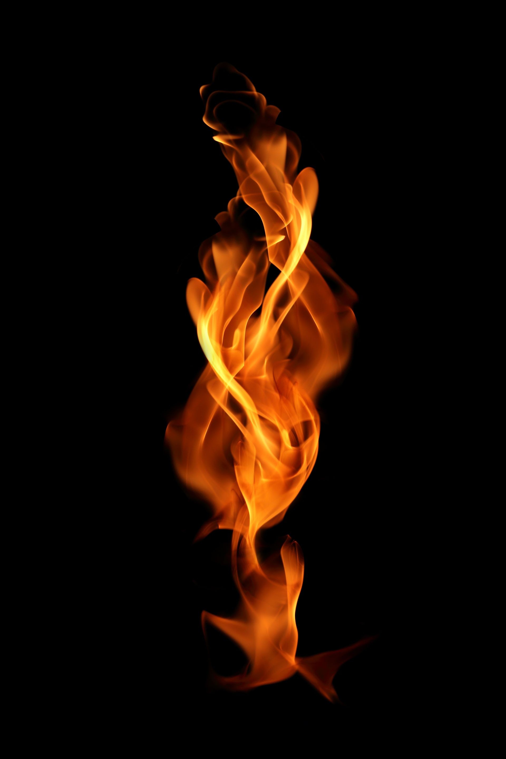 Fire flames isolated on black background.